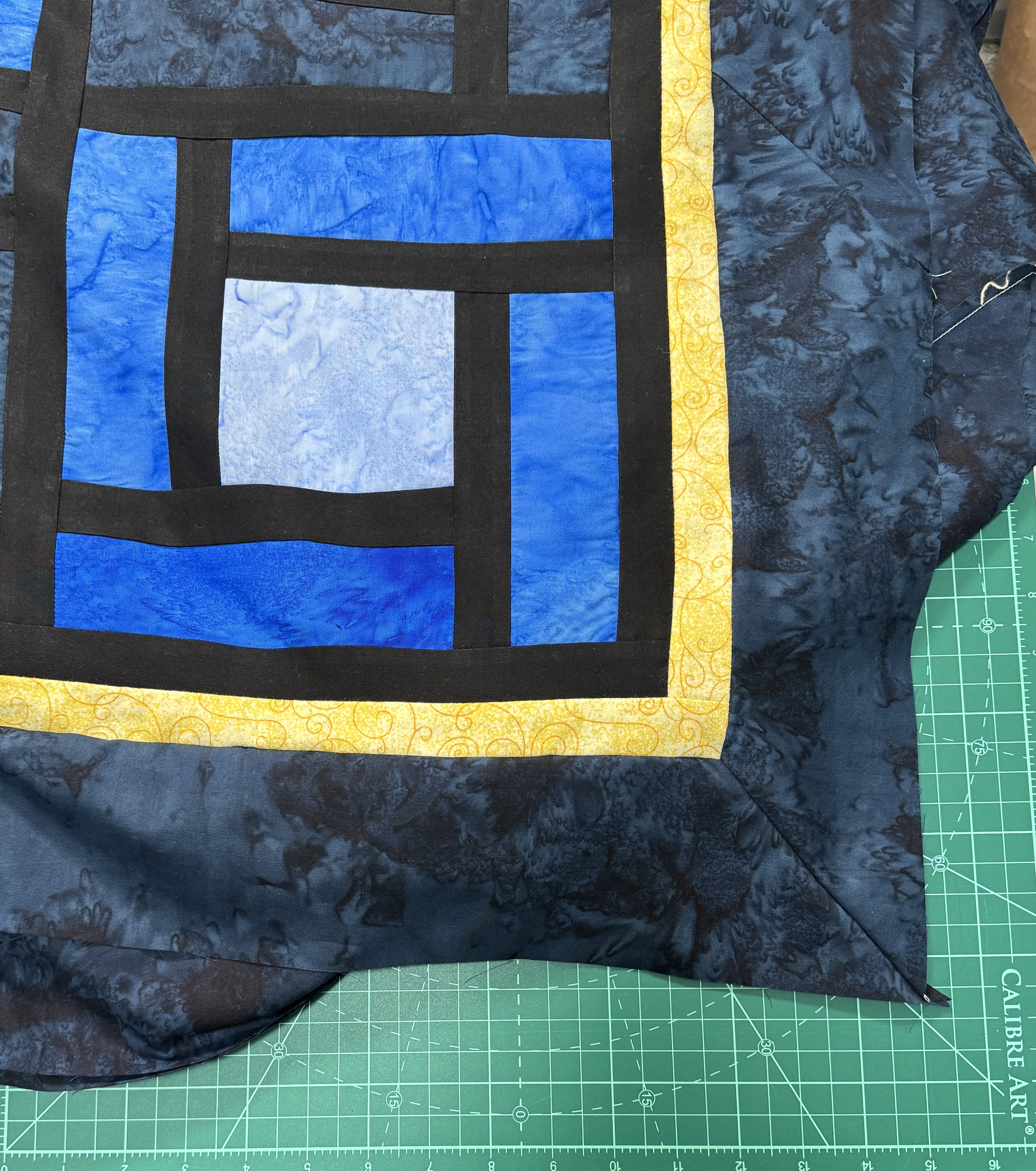 Close up view of the corner, showing a half decent mitered corner.